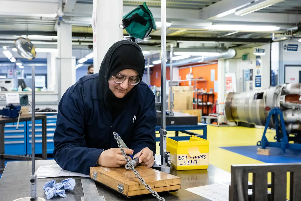 Female engineering student at work
